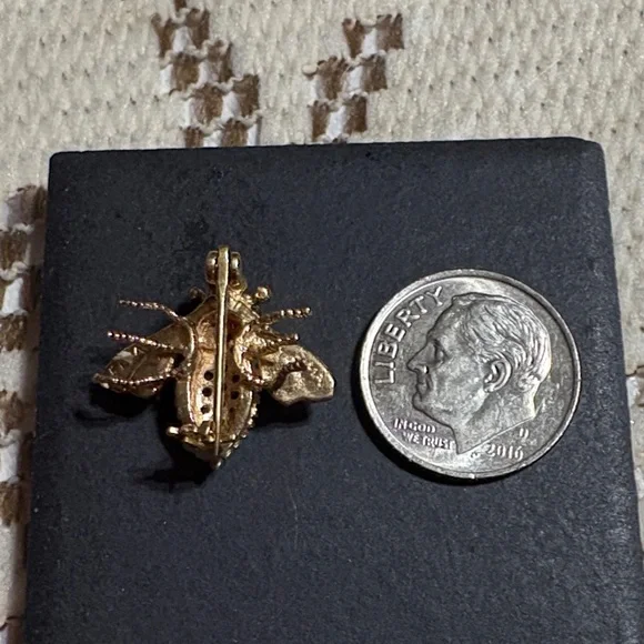 Genuine 14 kt gold bee brooches with rubies and diamonds